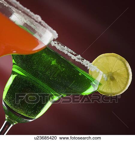 Close-up of two glasses of margarita View Large Photo Image Stock Image - Close-up of two glasses of margarita. Fotosearch