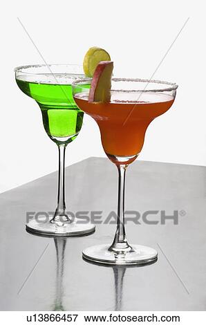 Close-up of two glasses of margarita View Large Photo Image Stock Photo - Close-up of two glasses of margarita. Fotosearch