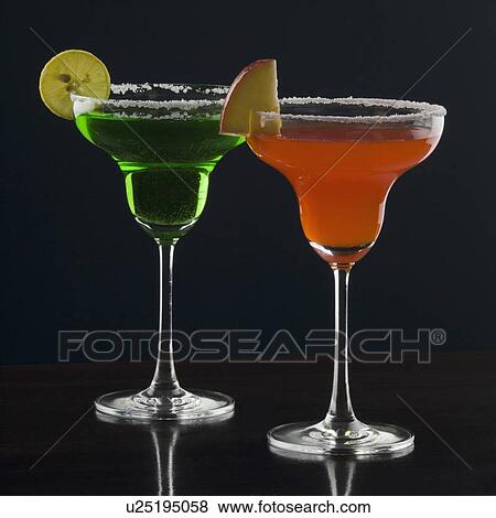 Close-up of two glasses of margarita View Large Photo Image Stock Photo - Close-up of two glasses of margarita. Fotosearch