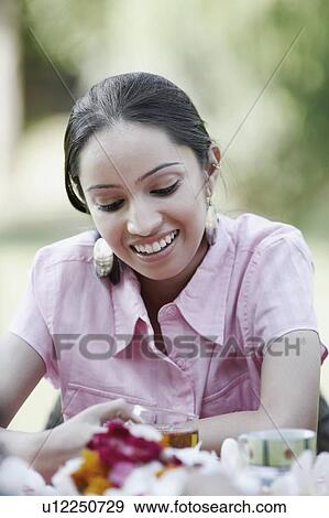 Stock Photo - Close-up of a teenage girl smiling. Fotosearch