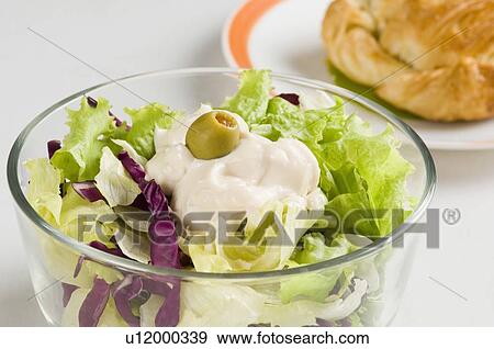 Close-up of a bowl of salad View Large Photo Image Stock Photo - Close-up of a bowl of salad. Fotosearch