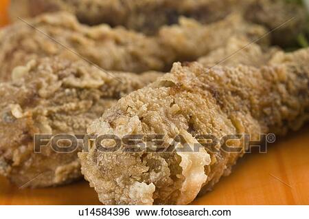 Stock Photograph - Close-up of fried chicken. Fotosearch