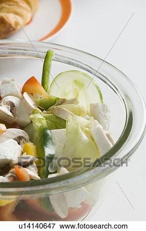 Close-up of raw vegetables in a bowl View Large Photo Image Stock Photo - Close-up of raw vegetables in a bowl. Fotosearch