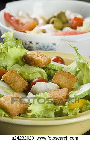 Stock Image - Close-up of two bowls of salad. Fotosearch
