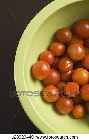 High angle view of a bowl of cherry tomatoes View Large Photo Image Stock Image - High angle view of a bowl of cherry tomatoes. Fotosearch
