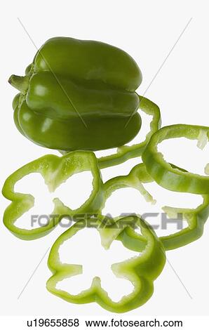 Close-up of a green bell pepper with slices View Large Photo Image Stock Photo - Close-up of a green bell pepper with slices. Fotosearch