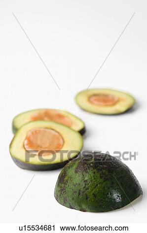 Stock Image - Close-up of avocados. Fotosearch