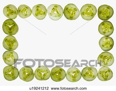 Stock Image - Close-up of cucumber slices. Fotosearch