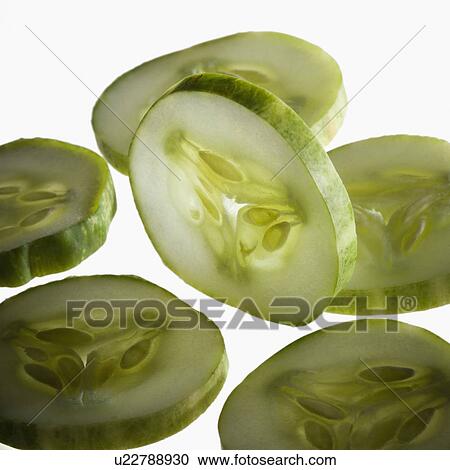 Stock Image - Close-up of cucumber slices. Fotosearch