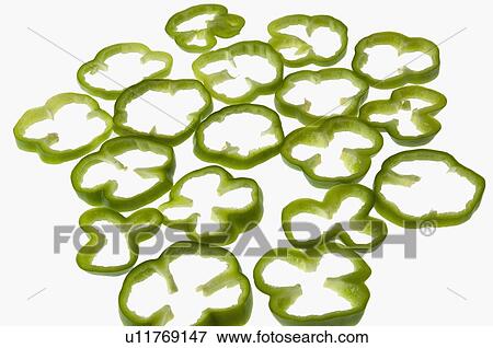 Stock Photo - Close-up of green bell pepper slices. Fotosearch