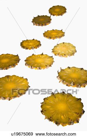 Stock Photo - Close-up of pineapple slices. Fotosearch