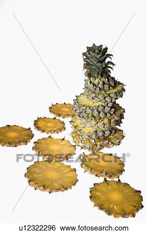 Stock Photograph - Close-up of pineapple slices. Fotosearch