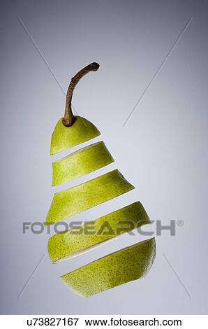 Stock Photo - Close-up of sliced pear. Fotosearch