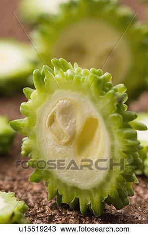 Stock Image - Close-up of slices of bitter melon. Fotosearch