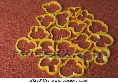 Stock Photo - Close-up of yellow bell pepper slices. Fotosearch