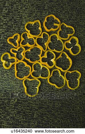 High angle view of yellow bell pepper slices View Large Photo Image Stock Image - High angle view of yellow bell pepper slices. Fotosearch