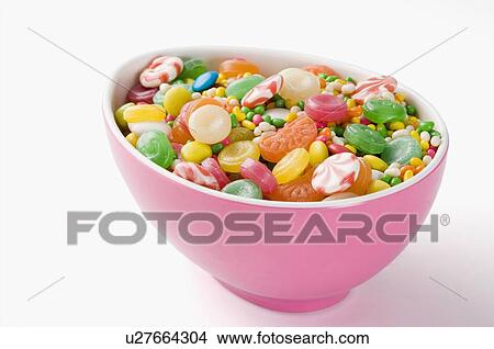 Picture - Close-up of a bowl filled with multi-colored candies. Fotosearch