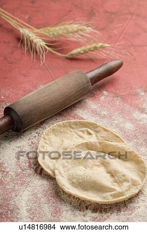 Close-up of chapattis with husk of wheat View Large Photo Image Picture - Close-up of chapattis with husk of wheat. Fotosearch