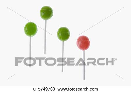 Stock Image - Close-up of four lollipops. Fotosearch