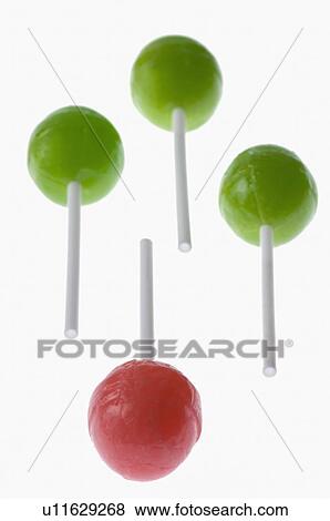 Stock Photo - Close-up of four lollipops. Fotosearch