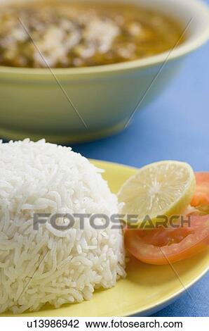 Stock Image - Close-up of rice in a plate. Fotosearch