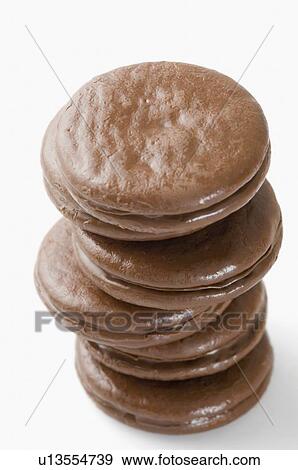High angle view of a stack of chocolate cookies View Large Photo Image Stock Photo - High angle view of a stack of chocolate cookies. Fotosearch