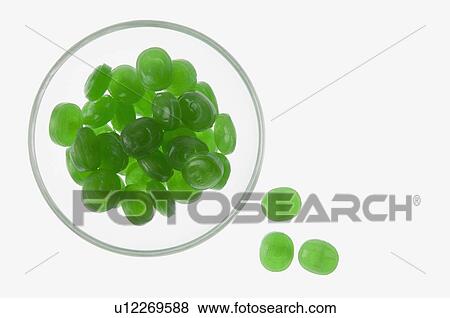 High angle view of green candies in a bowl View Large Photo Image Stock Photo - High angle view of green candies in a bowl. Fotosearch