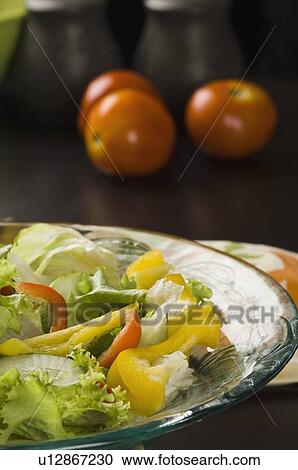 Close-up of a bowl of vegetable salad View Large Photo Image Stock Image - Close-up of a bowl of vegetable salad. Fotosearch