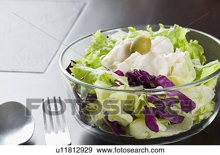 Close-up of salad in a bowl View Large Photo Image Stock Photo - Close-up of salad in a bowl. Fotosearch