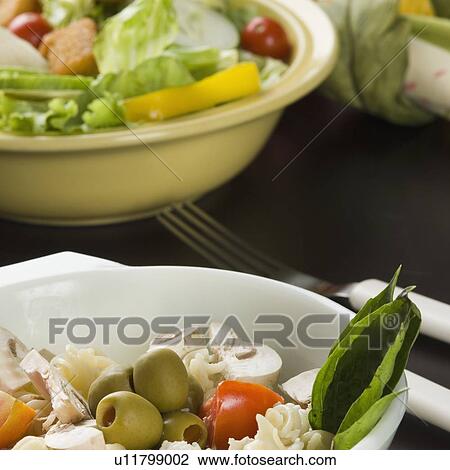 Close-up of two bowls of salad View Large Photo Image Stock Image - Close-up of two bowls of salad. Fotosearch