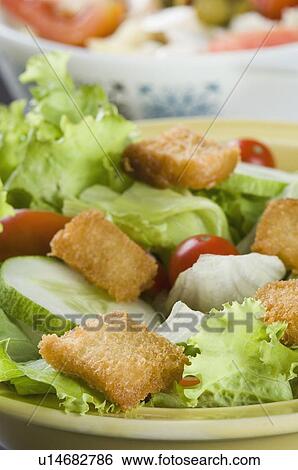 Close-up of two bowls of salad View Large Photo Image Stock Photograph - Close-up of two bowls of salad. Fotosearch