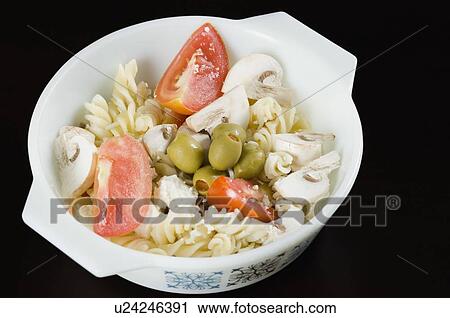 High angle view of a bowl of salad View Large Photo Image Stock Image - High angle view of a bowl of salad. Fotosearch