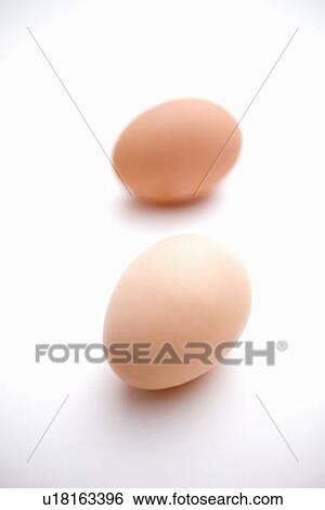 Stock Photograph - 2 brown eggs. Fotosearch