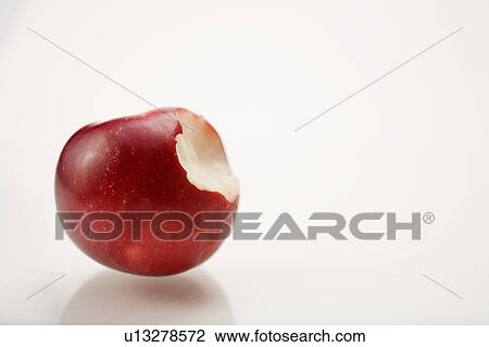 Organic apple with bite taken out View Large Photo Image Stock Image - Organic apple with bite taken out. Fotosearch