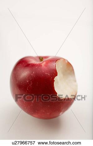 Stock Photo - Organic apple with bite taken out. Fotosearch