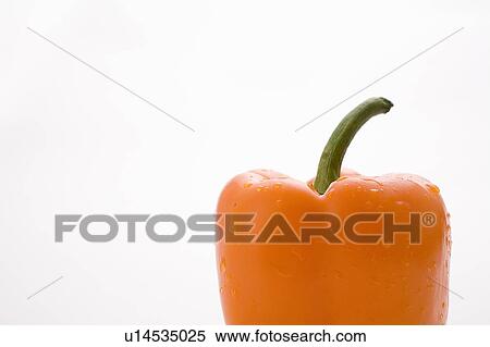 Stock Photography - Side view orange pepper. Fotosearch