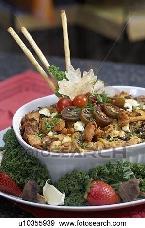 Egg soufflé with wild mushrooms and goat cheese garnished with black cherry tomatoes, breadsticks, kale and strawberries View Large Photo Image Stock Photo - Egg soufflé with wild mushrooms and goat cheese garnished with black cherry tomatoes, breadsticks, kale and strawberries. Fotosearch