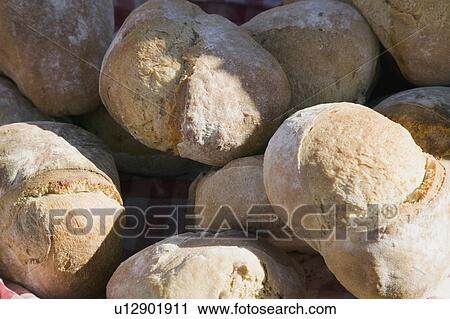 Stock Image - Fresh bread rolls, Saturday Market Salt Spring Island, British Columbia, Canada. Fotosearch