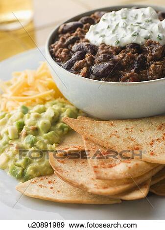 Bowl of Chilli with Tortilla Chips View Large Photo Image Stock Photo - Bowl of Chilli with Tortilla Chips. Fotosearch
