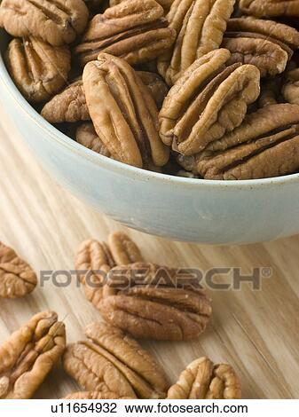 Stock Image - Bowl of Pecan Nuts. Fotosearch