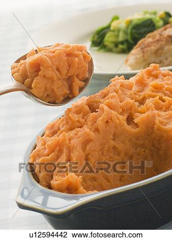 Dish of Sweet Potato Mash with a spoon View Large Photo Image Stock Image - Dish of Sweet Potato Mash with a spoon. Fotosearch