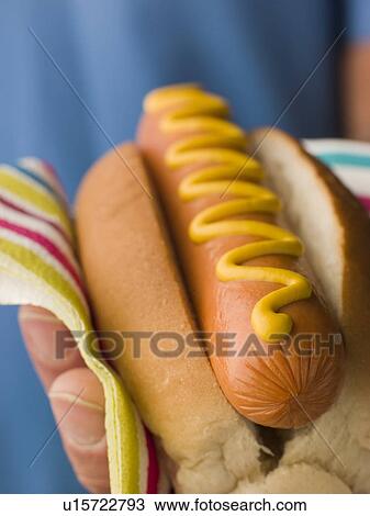 Hot Dog with Mustard in a Napkin View Large Photo Image Stock Image - Hot Dog with Mustard in a Napkin. Fotosearch