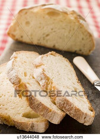 Loaf and Slices of American Sour Dough Bread View Large Photo Image Stock Photo - Loaf and Slices of American Sour Dough Bread. Fotosearch