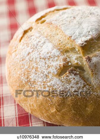Stock Photo - Loaf of American Sour Dough Bread. Fotosearch