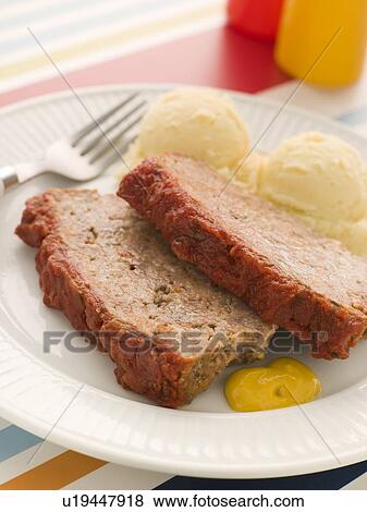 Meatloaf Baked in Tomato sauce with Mashed Potatoes and Mustard View Large Photo Image Stock Photo - Meatloaf Baked in Tomato sauce with Mashed Potatoes and Mustard. Fotosearch