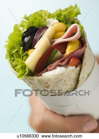 Stock Image - Open Deli Tortilla Wrap in a Napkin. Fotosearch