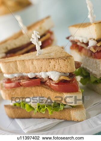 Toasted Triple Decker Club Sandwich with Fries View Large Photo Image Stock Image - Toasted Triple Decker Club Sandwich with Fries. Fotosearch