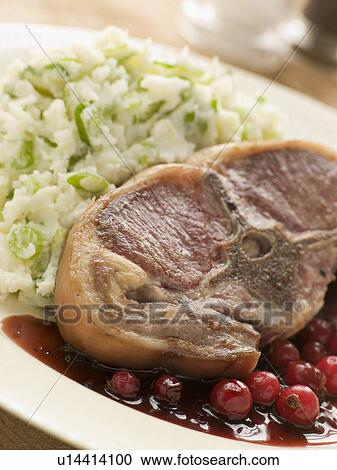 Double Loin Lamb Chops with Champ and Redcurrant Jus View Large Photo Image Stock Image - Double Loin Lamb Chops with Champ and Redcurrant Jus. Fotosearch