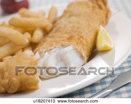 Fish and Chips with Lemon and Tomato Ketchup View Large Photo Image Stock Image - Fish and Chips with Lemon and Tomato Ketchup. Fotosearch