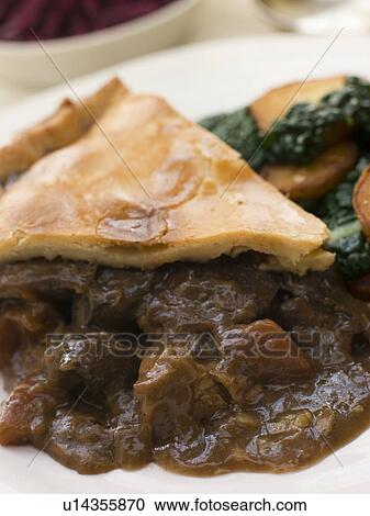 Game Pie with Fried Curly Kale and Potatoes View Large Photo Image Stock Image - Game Pie with Fried Curly Kale and Potatoes. Fotosearch